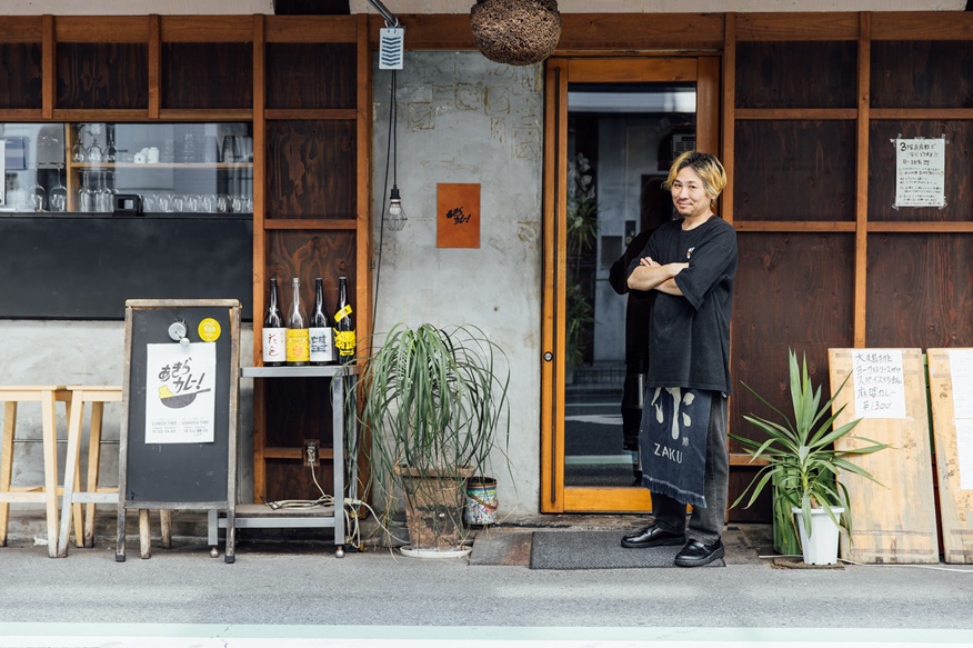 Mr. Ota in front of the shop.