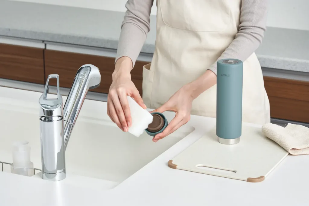 Cleaning the bottle.