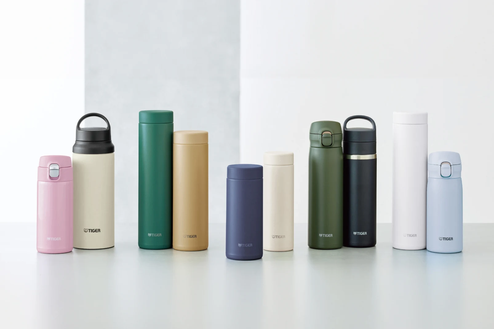 A variety of water bottles lined up.