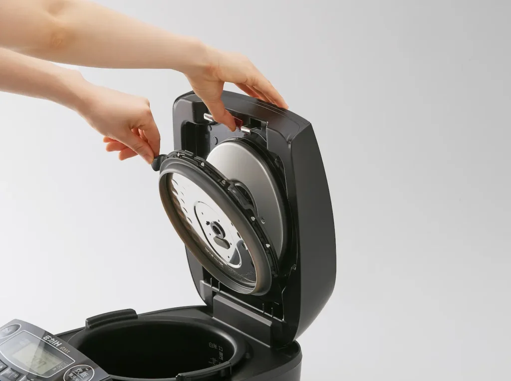 Rice cooker with its lid open